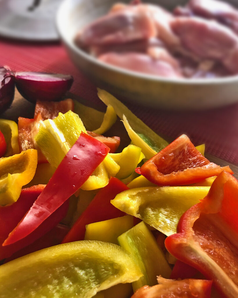 red and yellow bell peppers cut in raw pieces